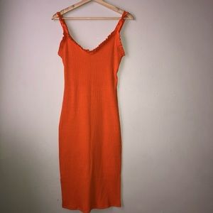 Zara’s Orange fitted dress